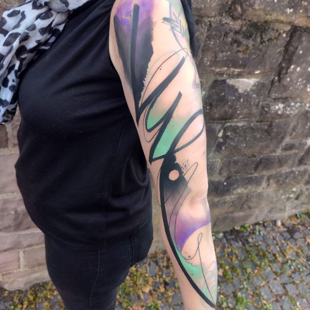 Abstract watercolor tattoo