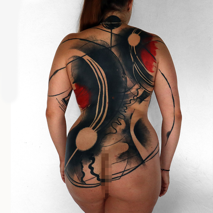 Full back abstract tattoo