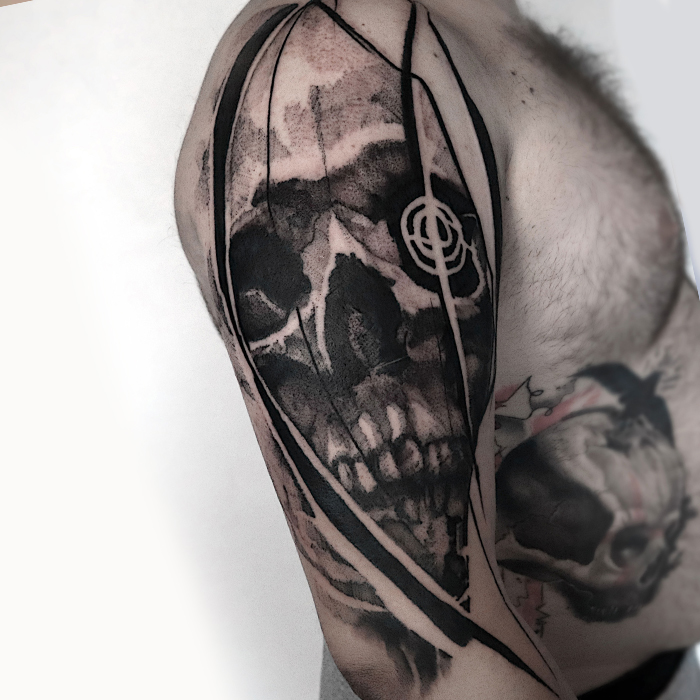Graphic skull tattoo