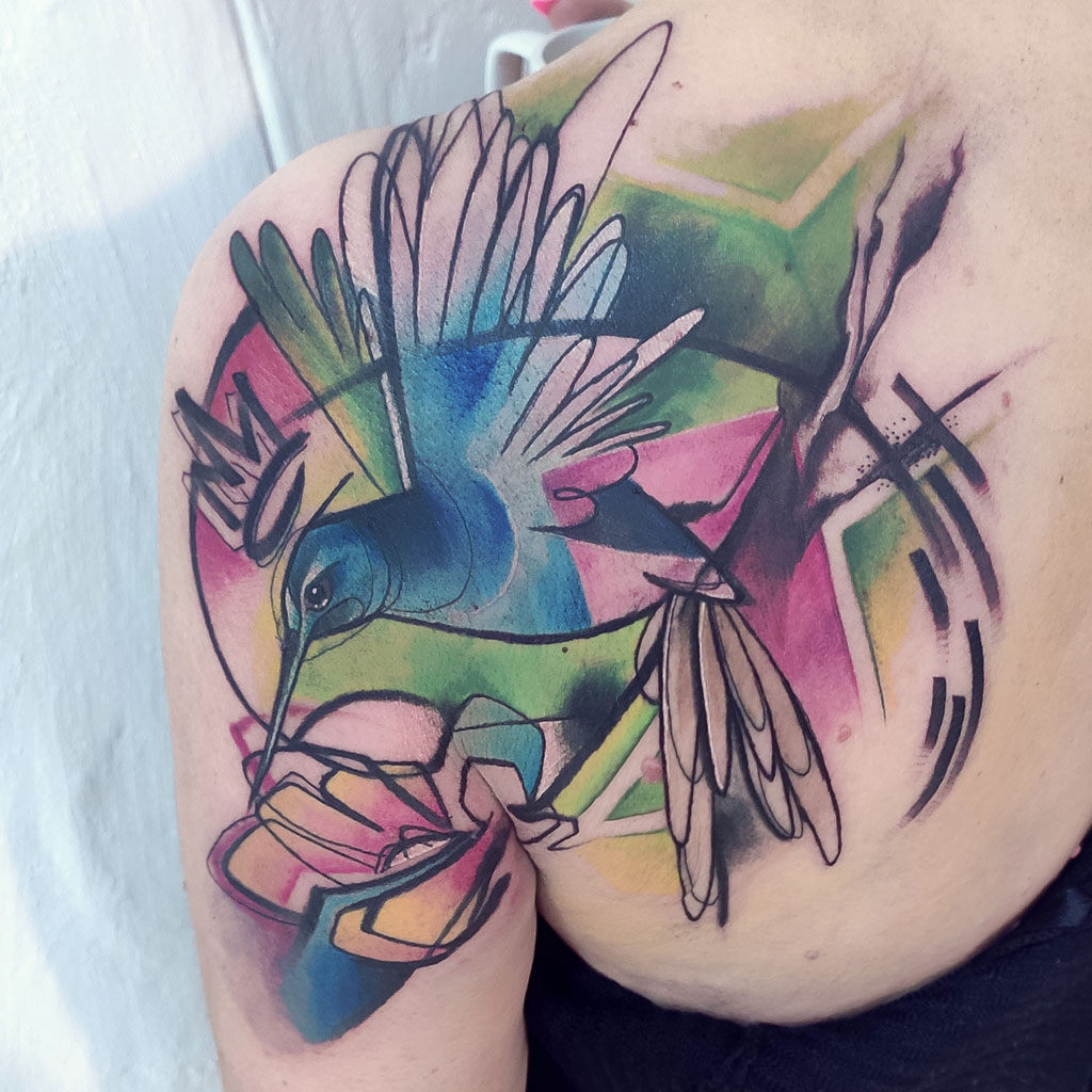 Abstract watercolor coverup colibri tattoo
