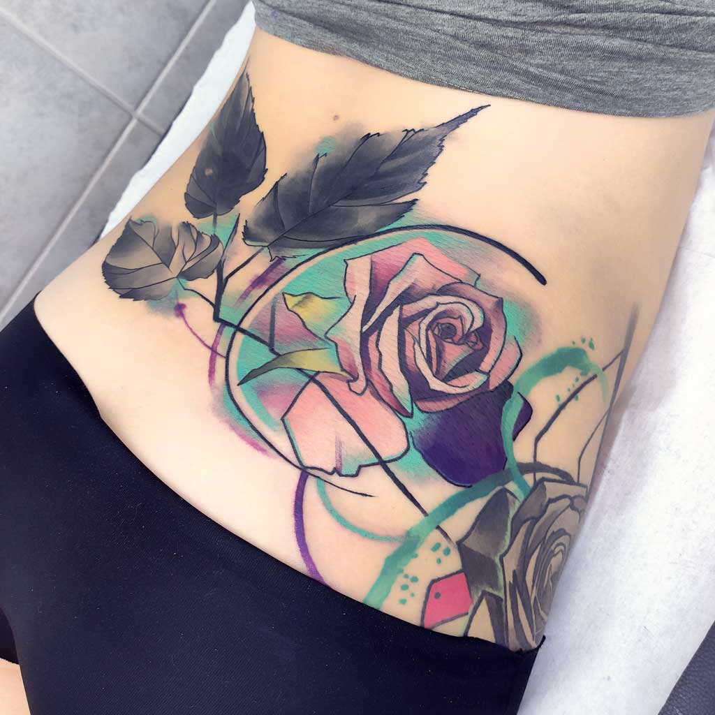 Abstract watercolor rose coverup tattoo
