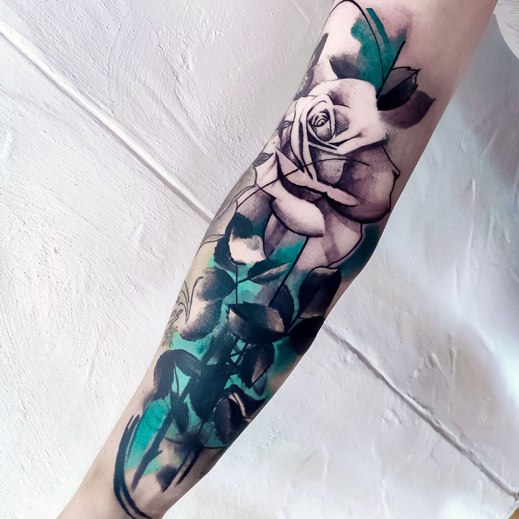 Abstract watercolor rose cover tattoo
